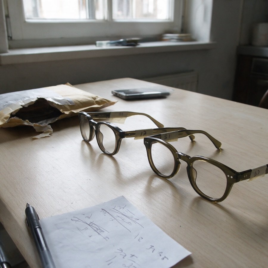 Three sample versions of the frame on a kitchen table